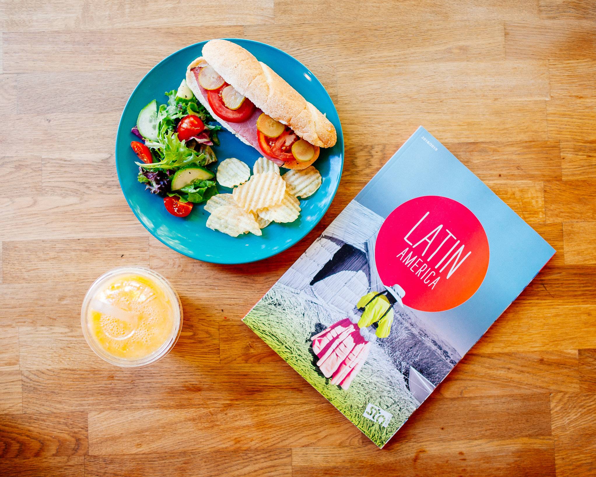 food, drinks and magazine on a table