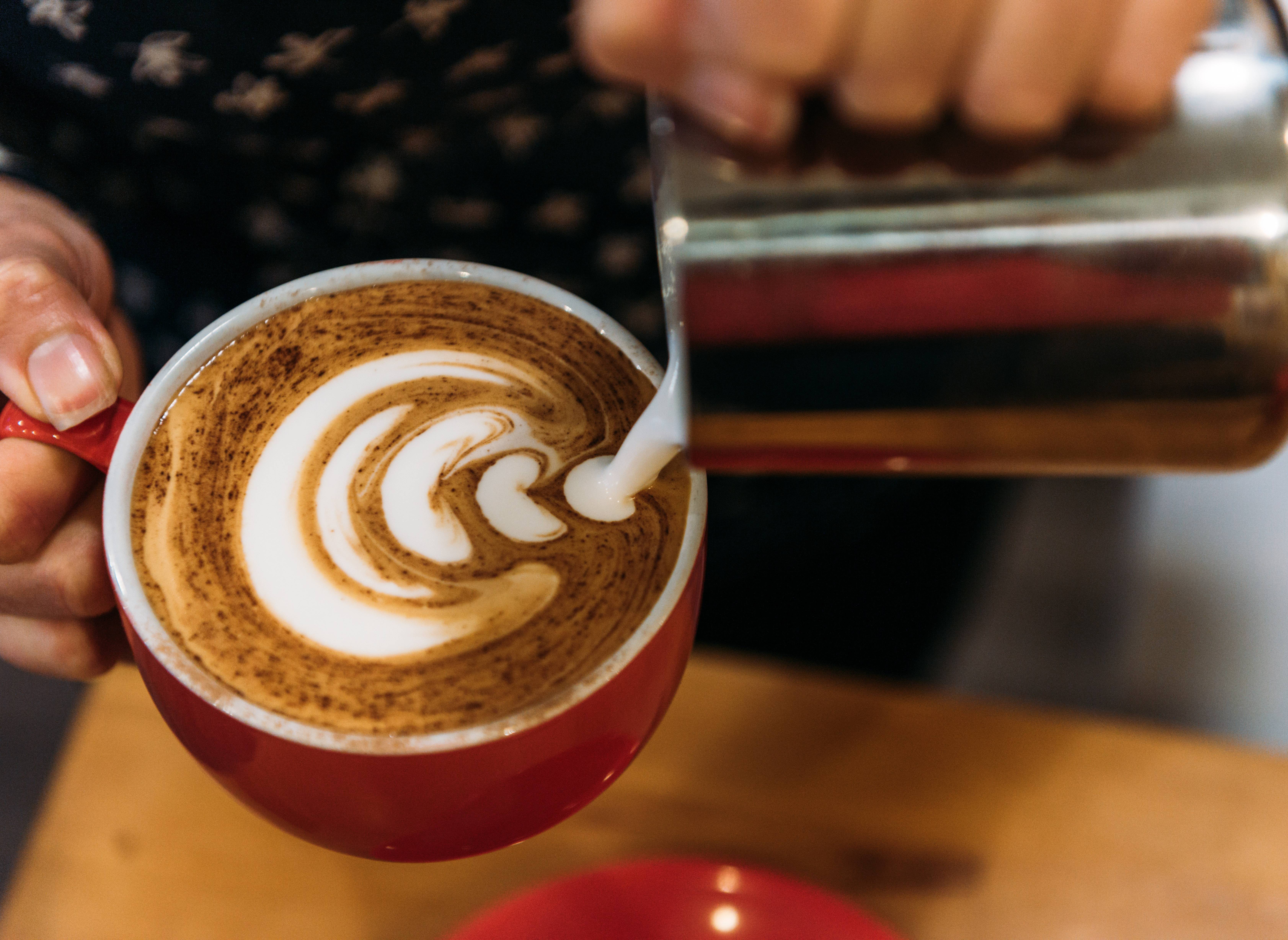 A cup displaying Latte art
